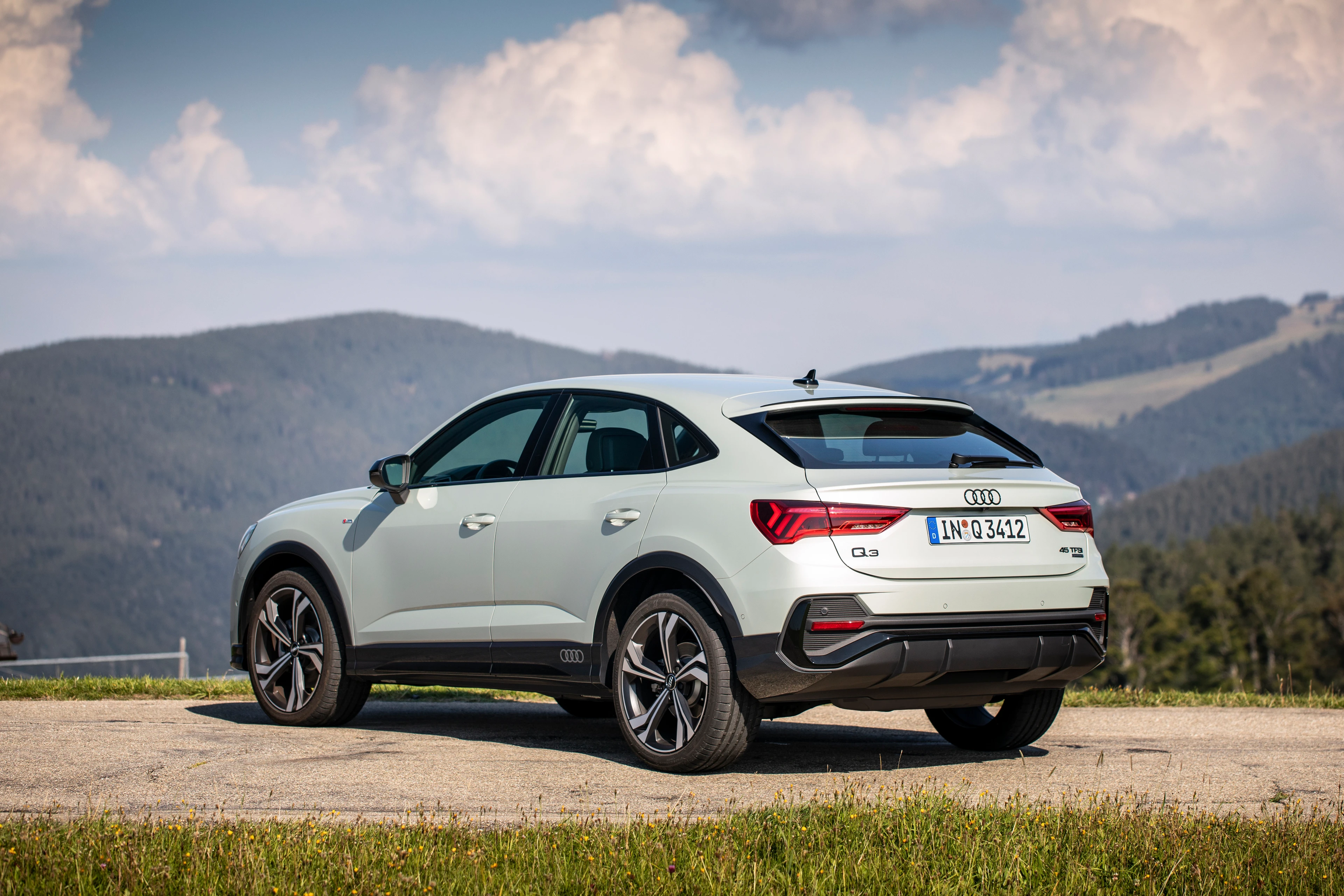 Rear Left Three-Quarter View (Mountains)