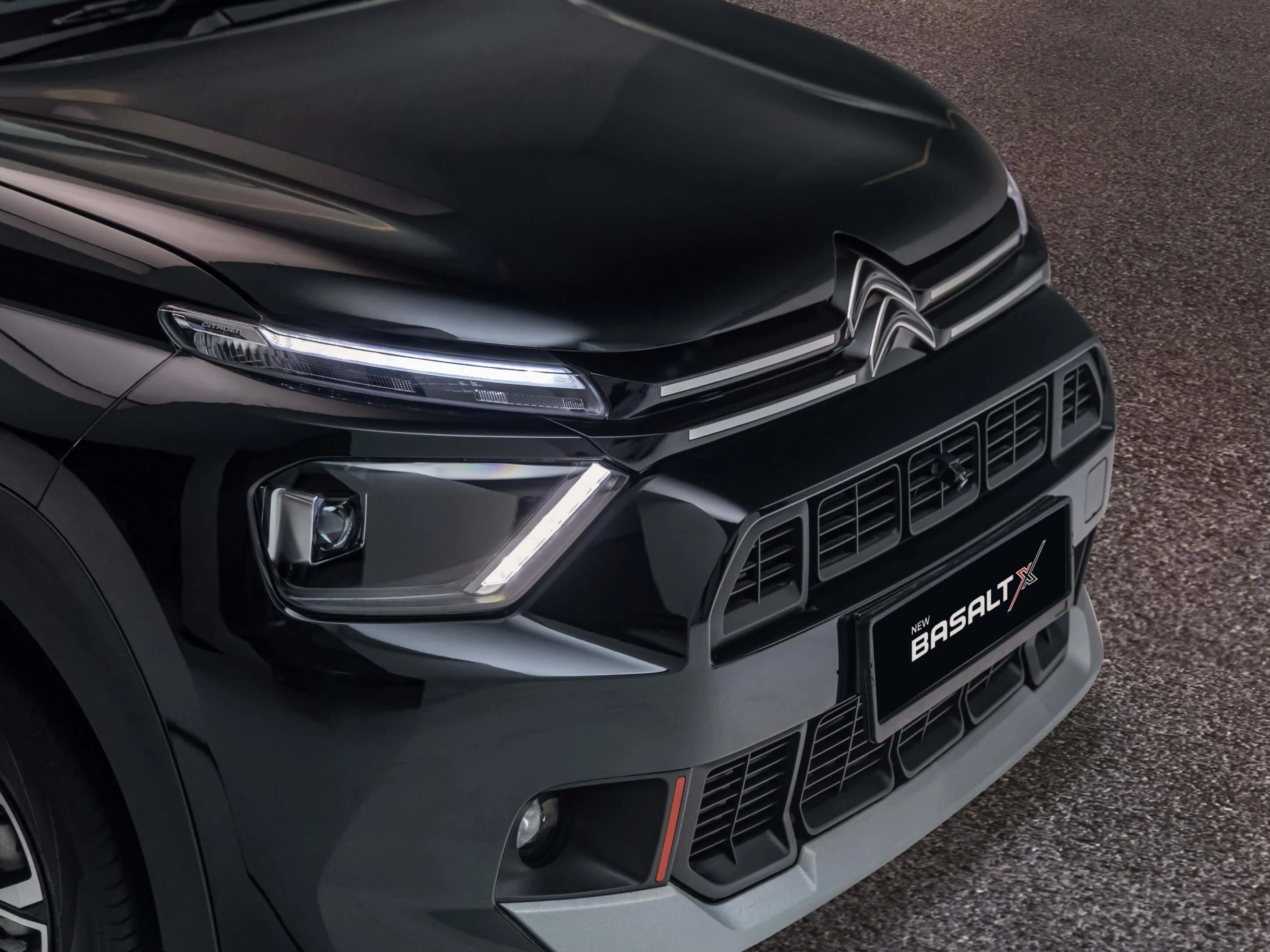 Front Grille And Basalt X Badge