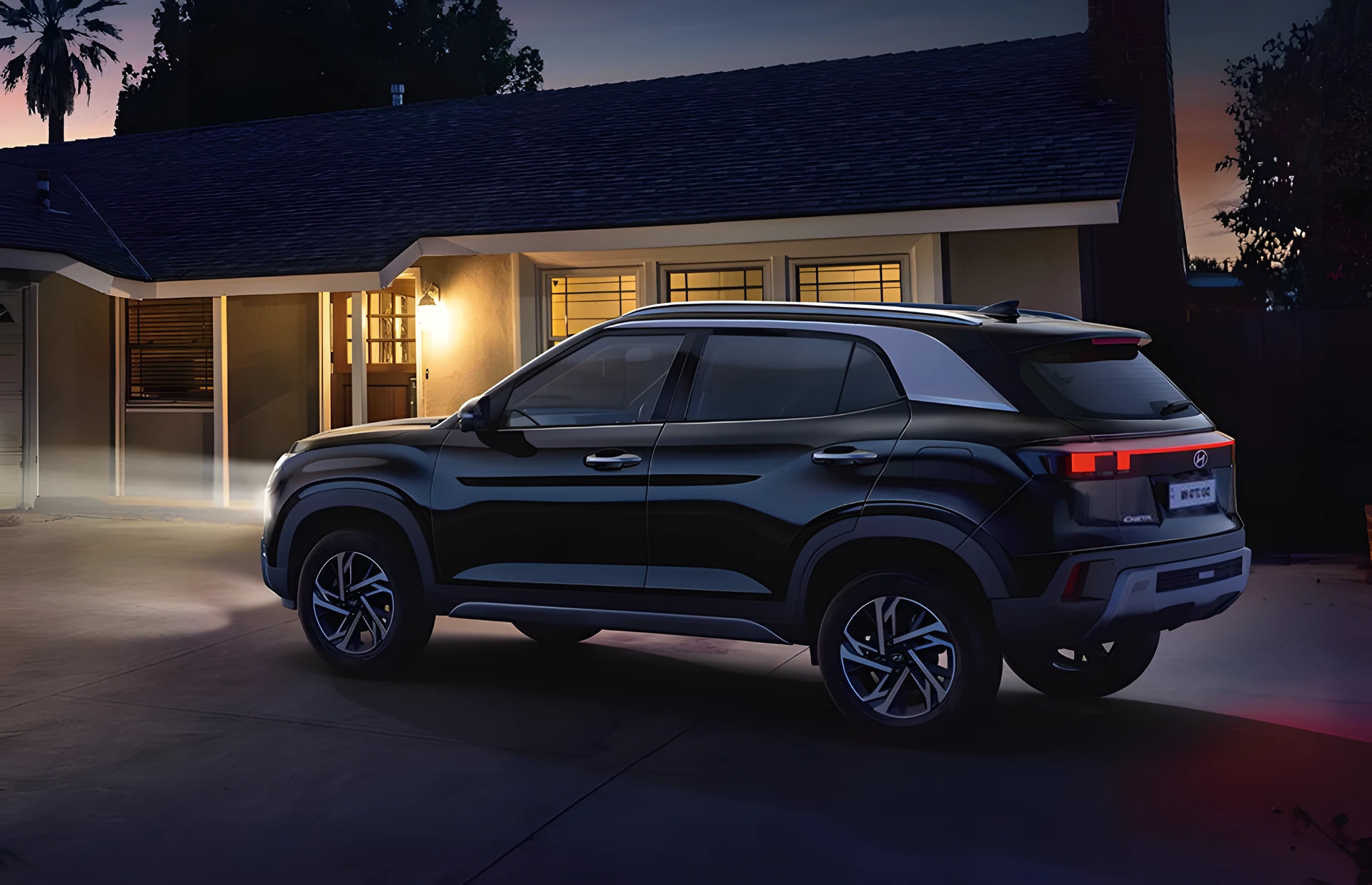 Rear Three-Quarter (Night Driveway)