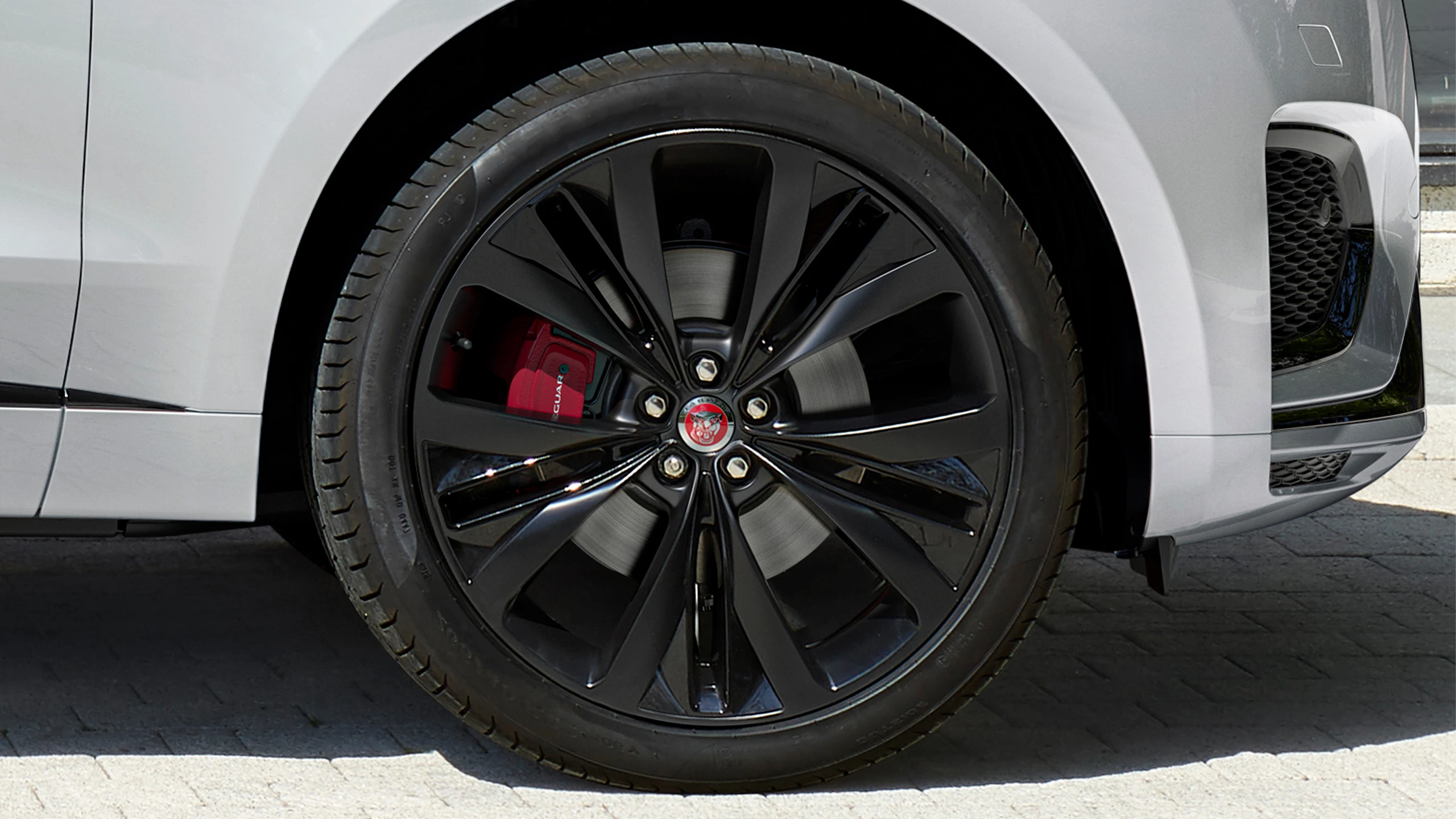 Alloy wheel with red brake caliper