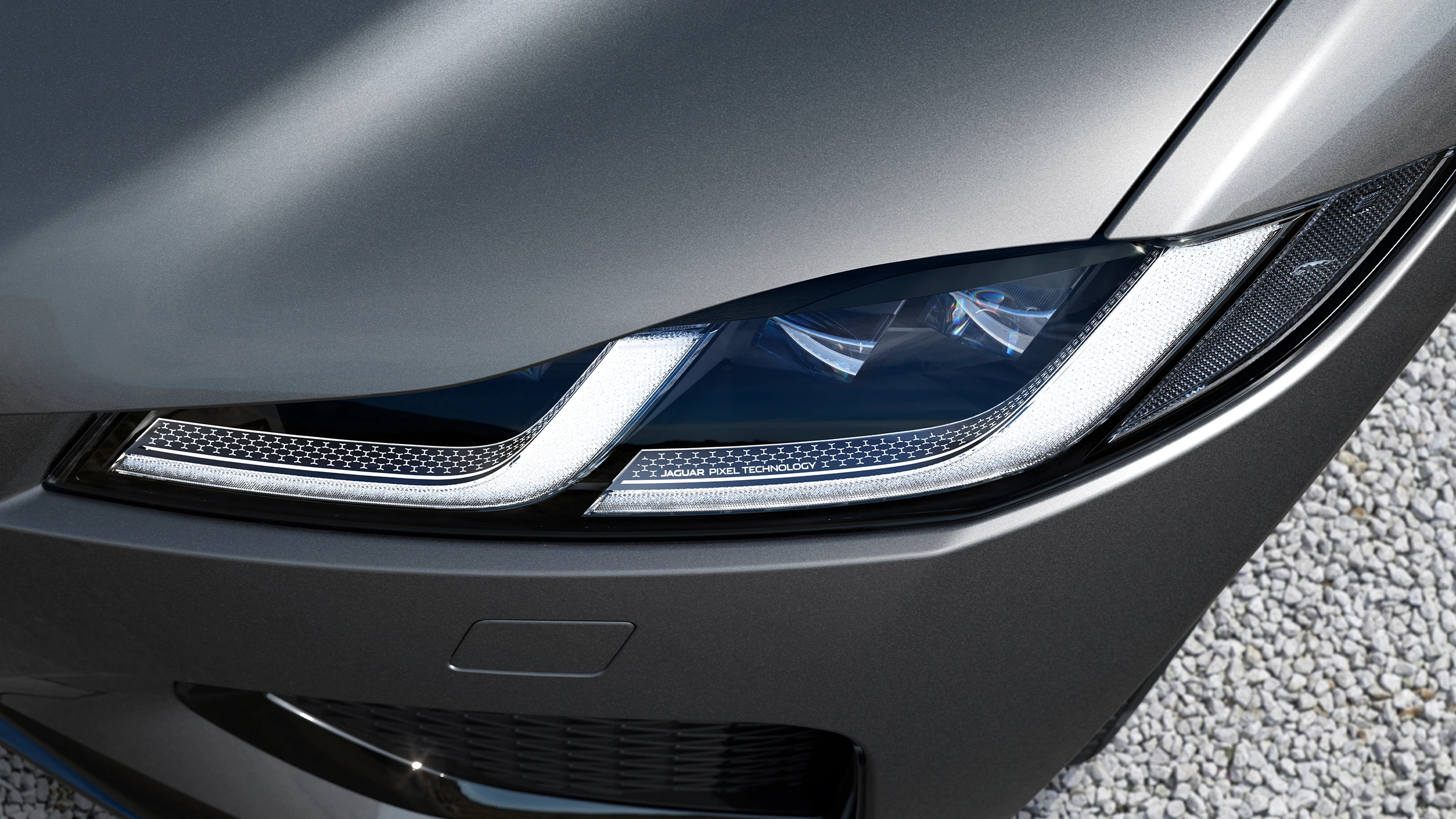 LED headlamp with J-blade daytime running light