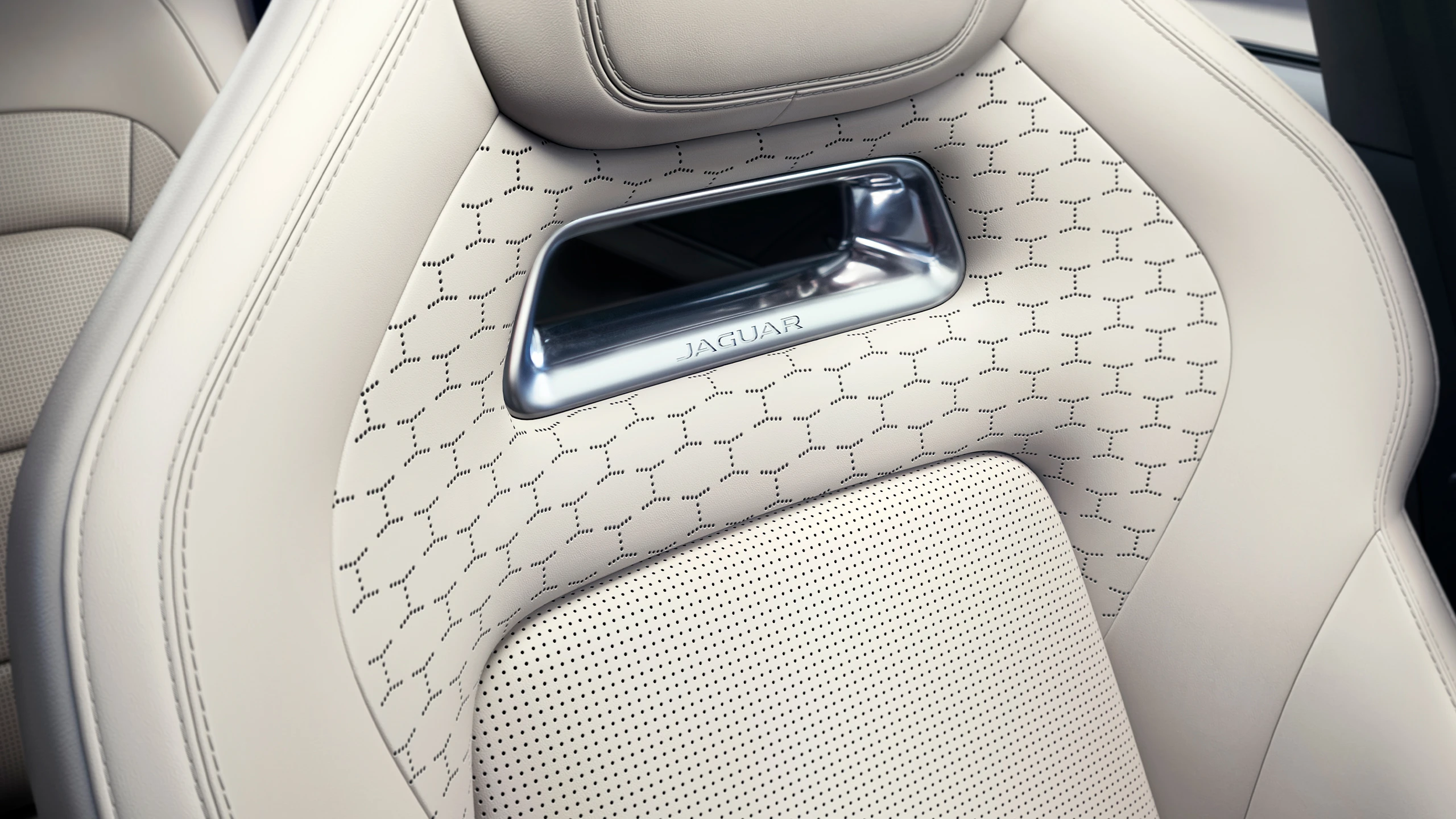 Seat backrest with Jaguar script