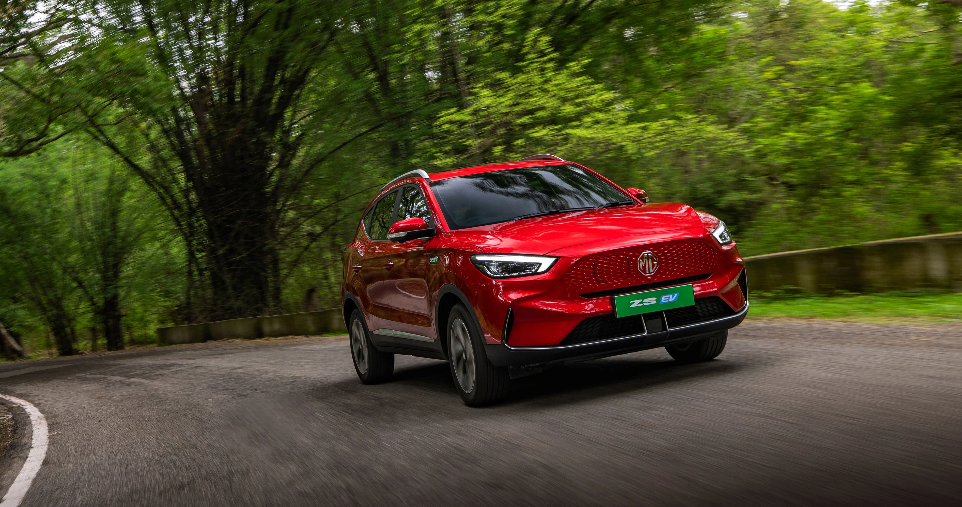 Front Left Three-Quarter on a Forest Road