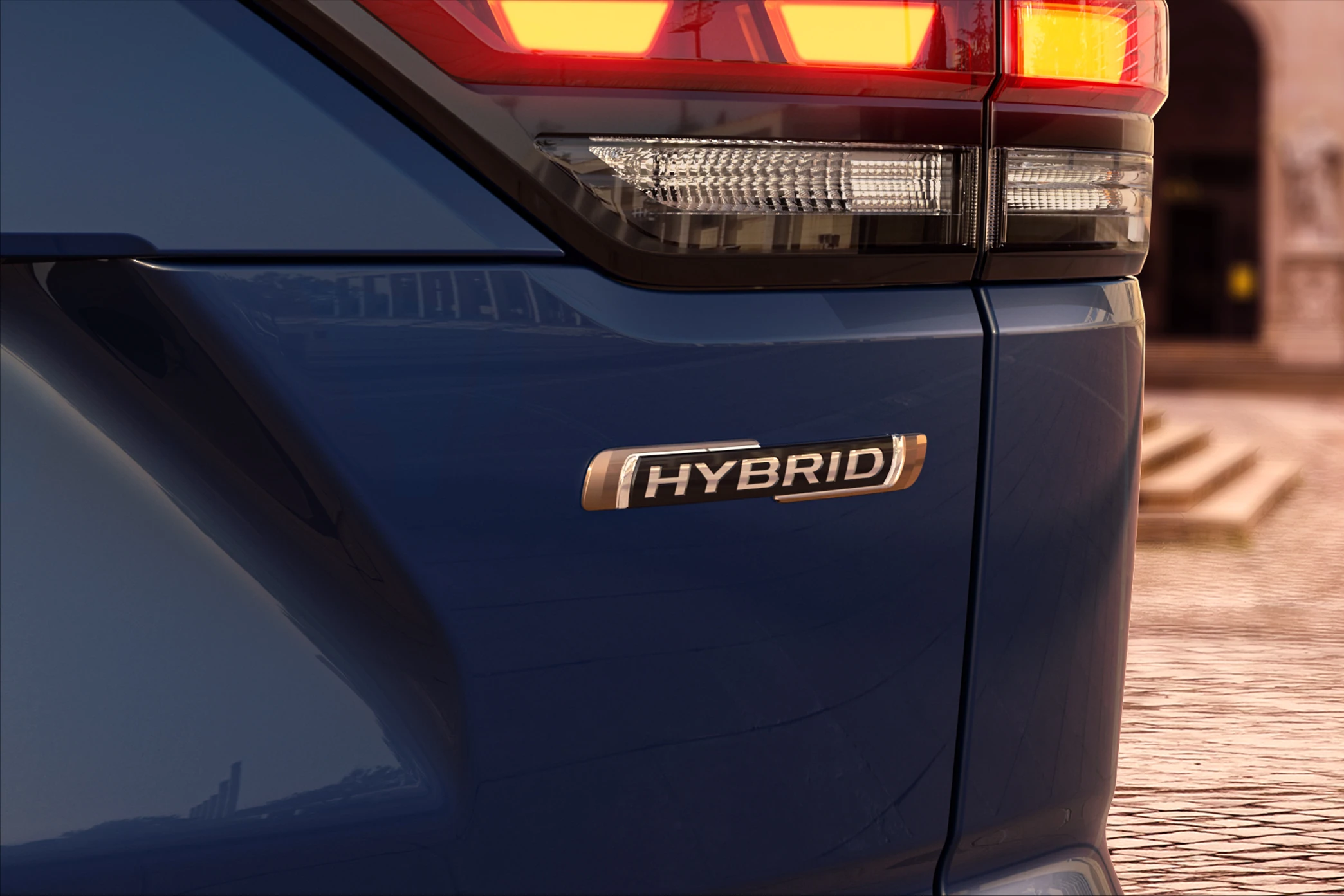 Hybrid Badge and Tail Lamp