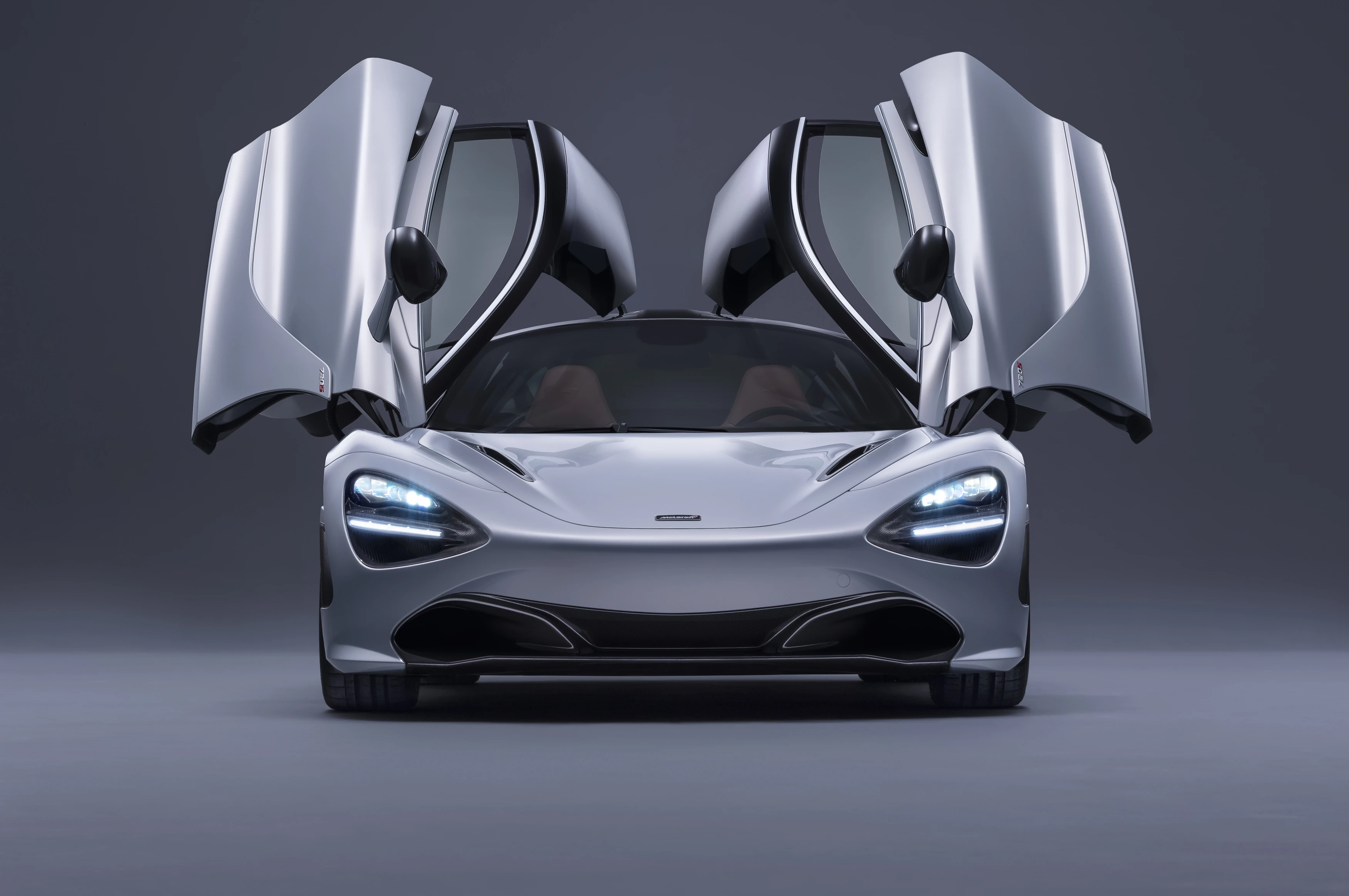 720S with dihedral doors open