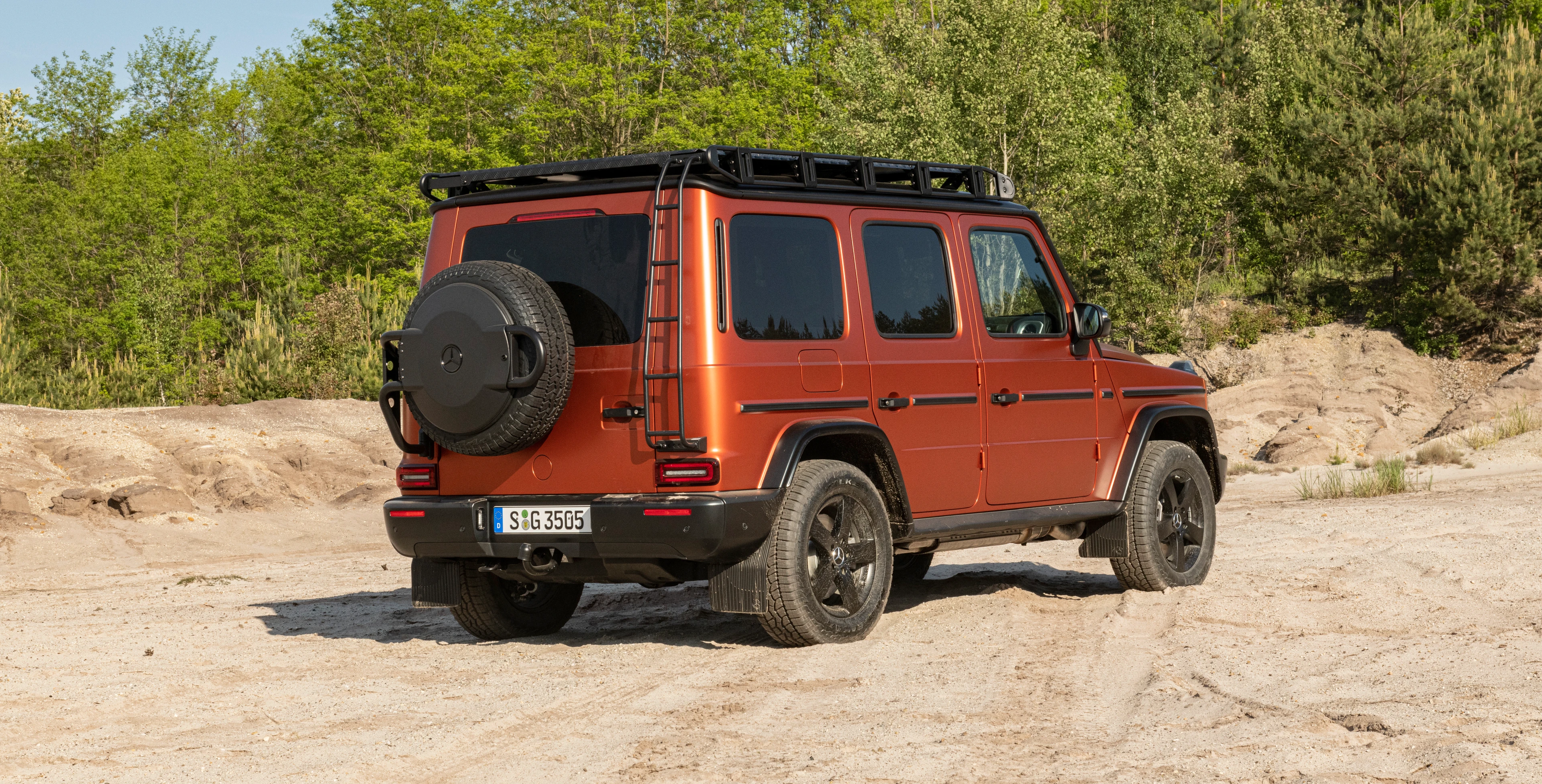Mercedes-Benz G-Class — Rear Left Three-Quarter View (Roof Rack)