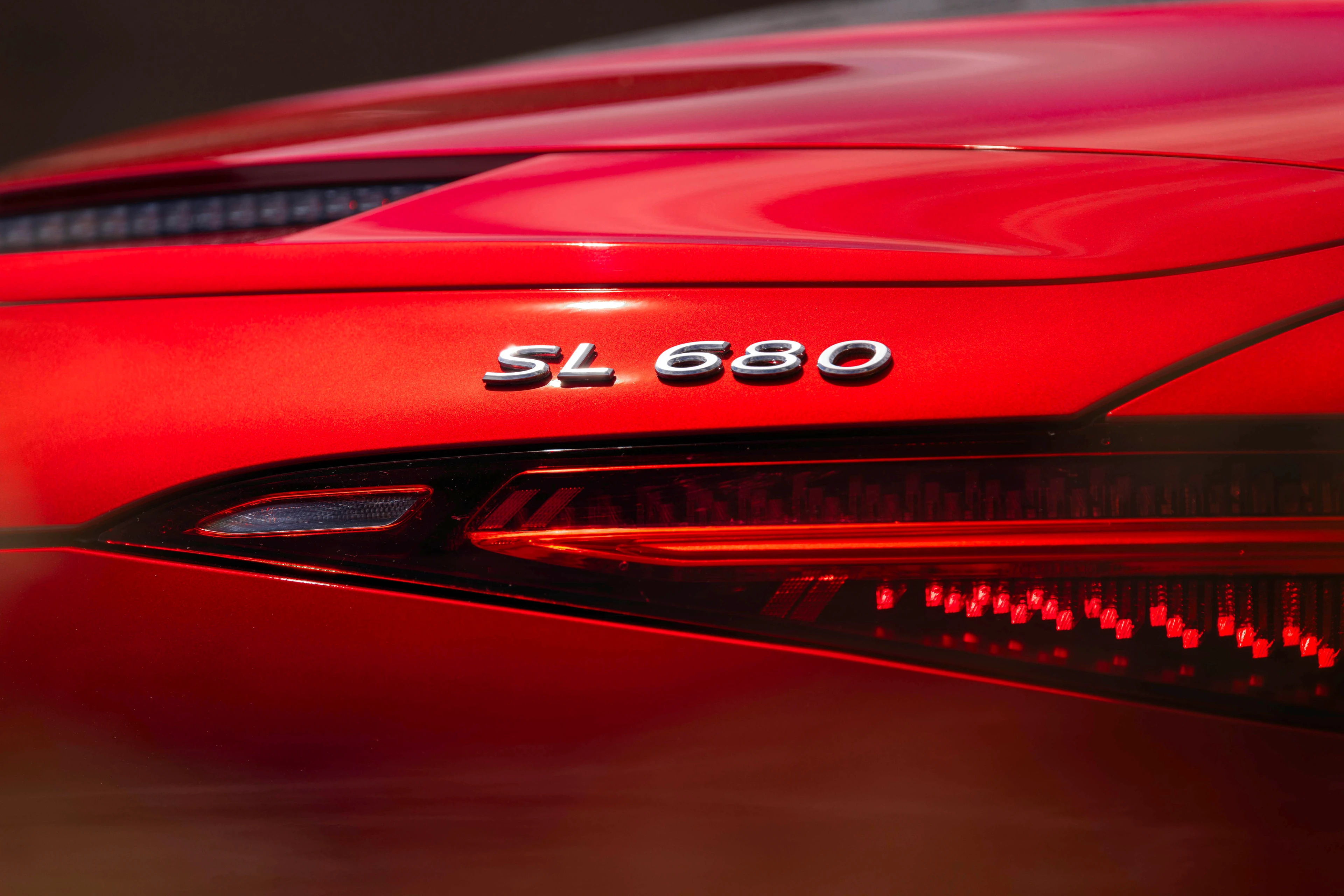SL 680 Badge and Tail Lamp