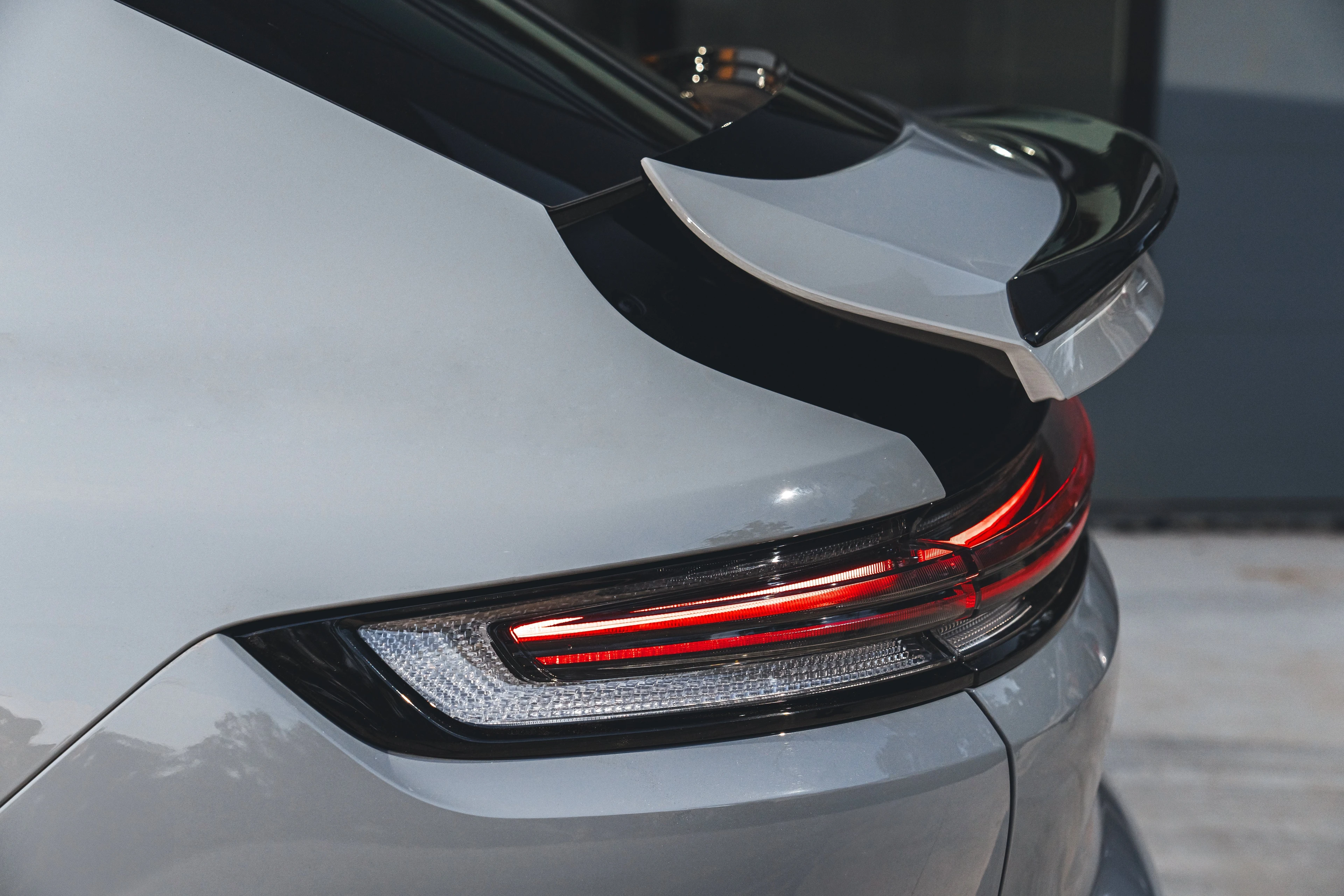 Adaptive Rear Spoiler and Tail Lamp