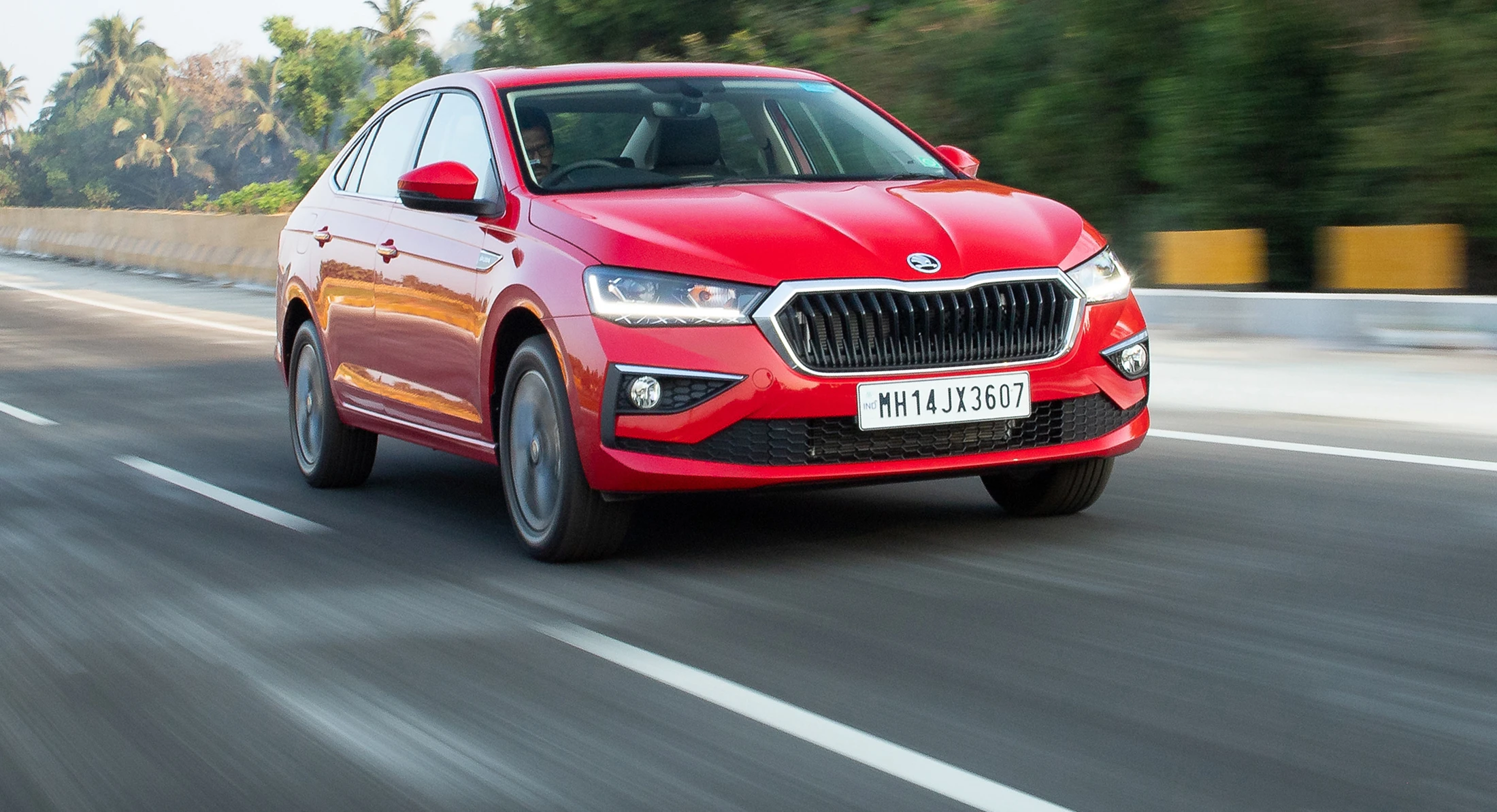 Driving: Front Right Three-Quarter View (Red)