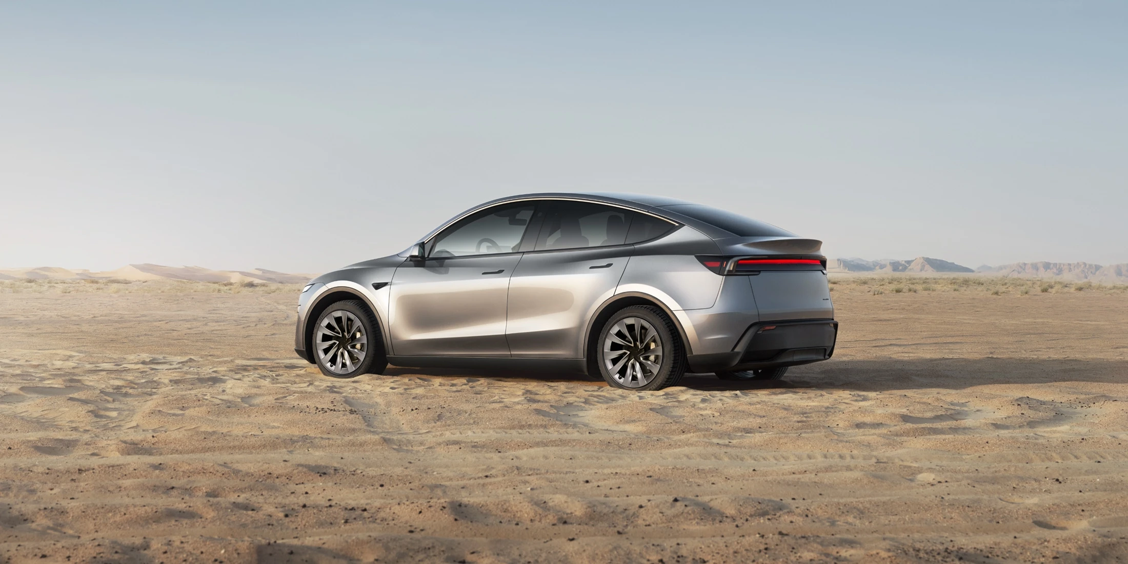 Rear Left Three-Quarter View (Sand)