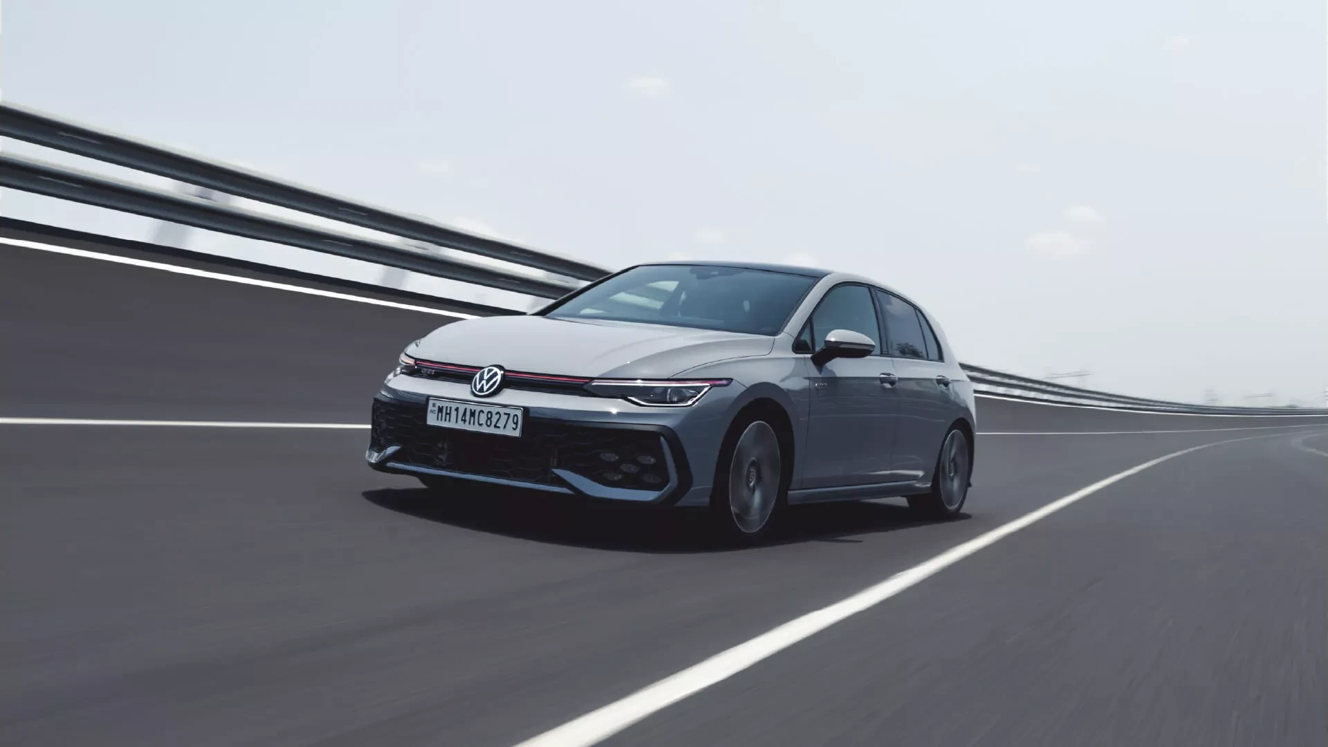 On the Banked Track: Front Left Three-Quarter