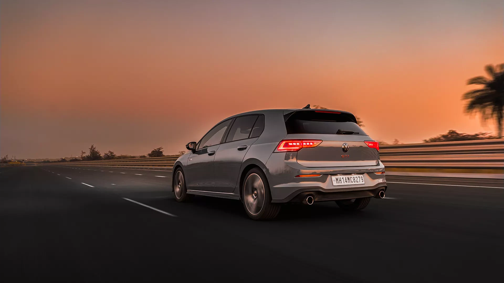 Driving: Rear Left Three-Quarter at Dusk