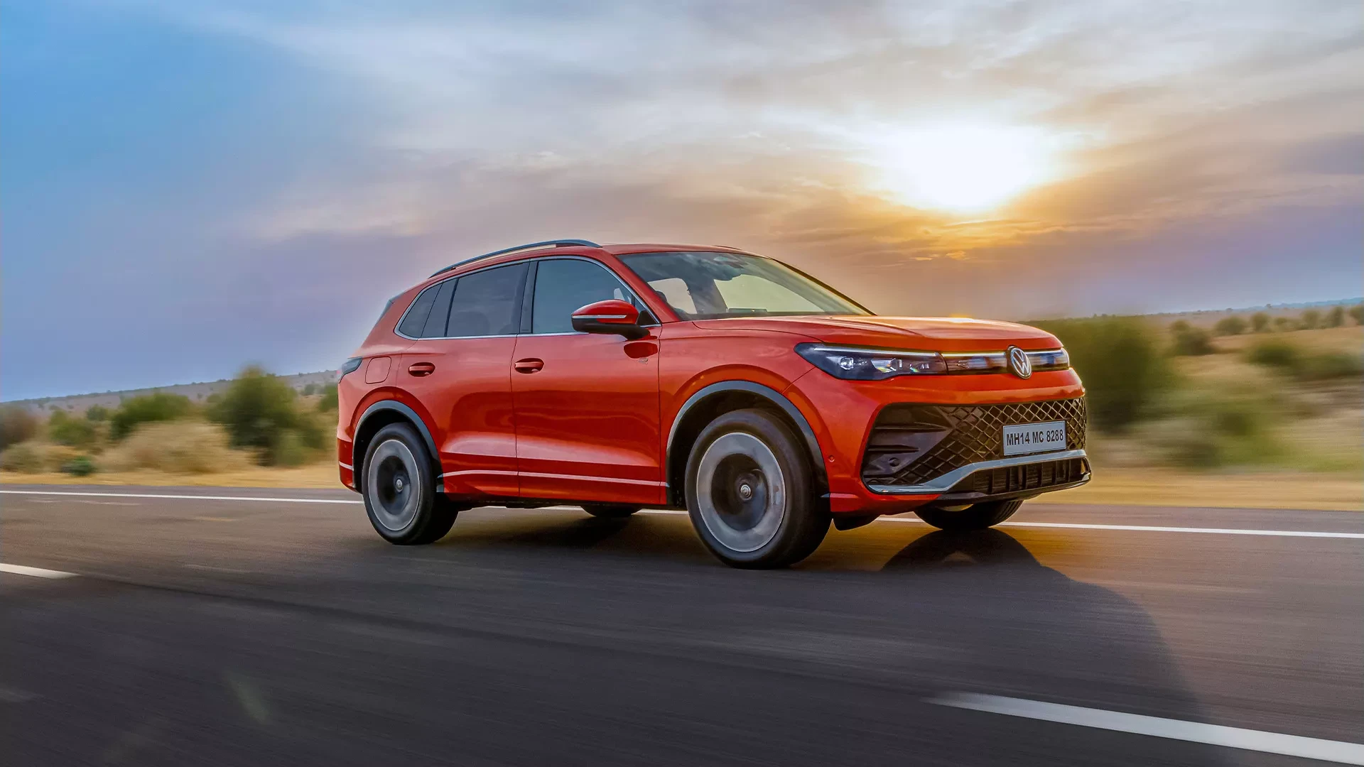 Driving: Front Right Three-Quarter at Sunset